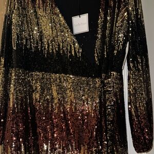 Black and gold sequin dress